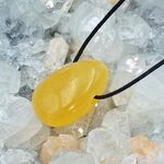 Side Drilled Orange Calcite Tumble Stones